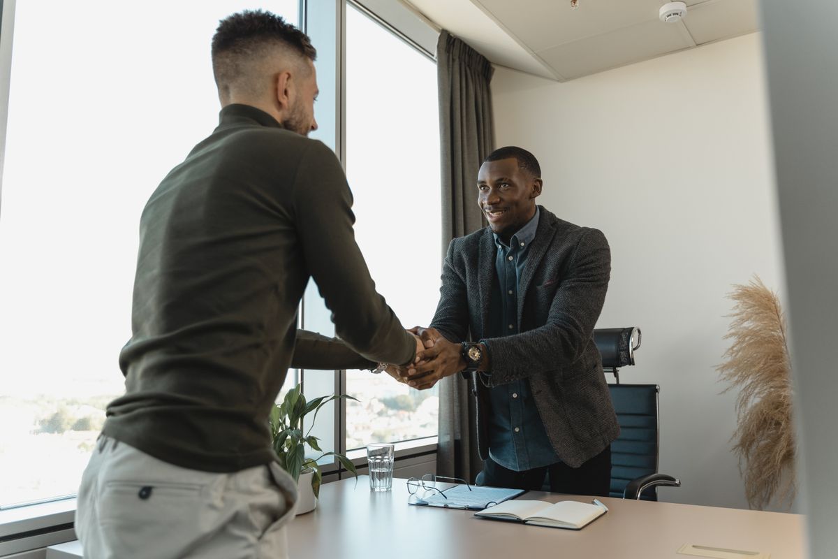 hiring manager reviewing candidate CV and interview