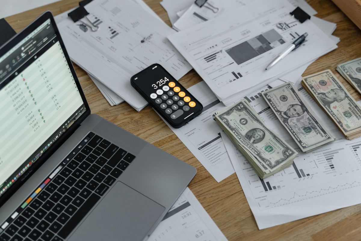 professional calculating budget for career investment